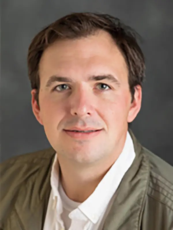 Headshot photo of Stephen Collins-Elliot