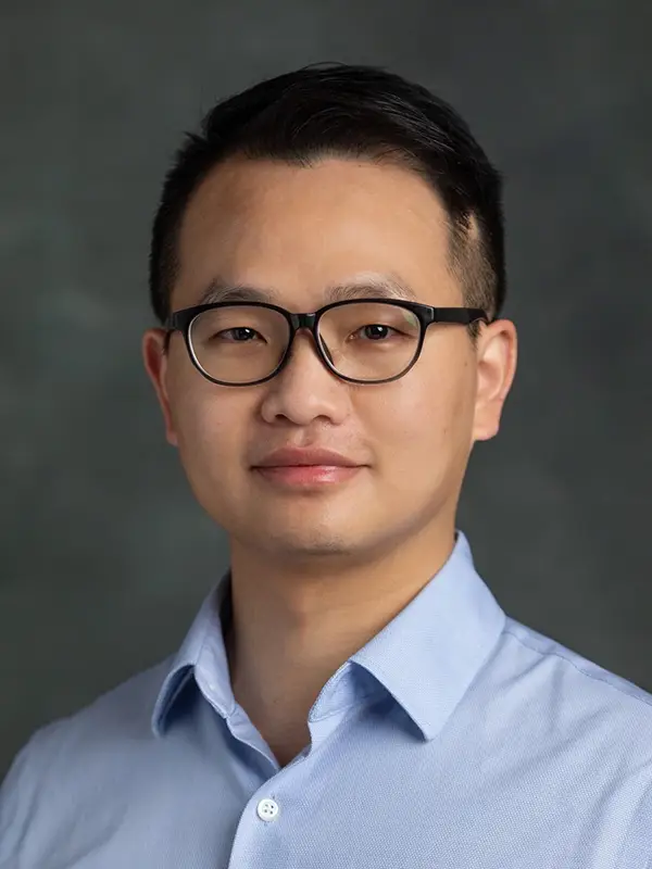 headshot photo of Jiangen He